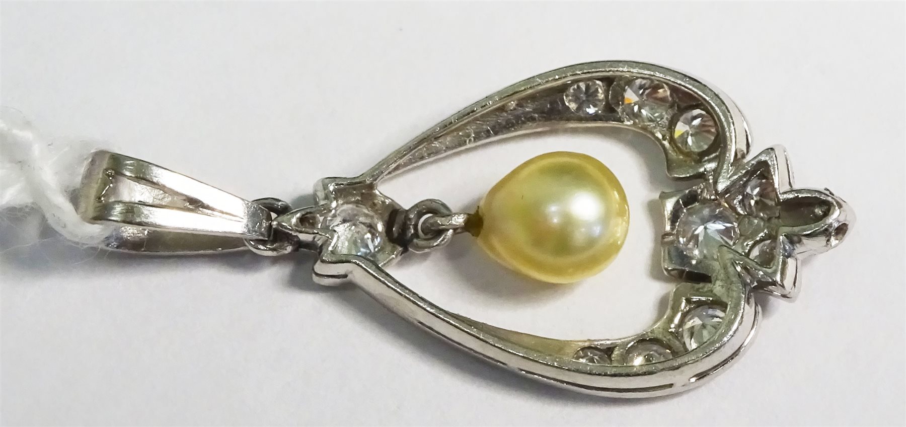 Platinum diamond and pearl, milgrain set pendant 