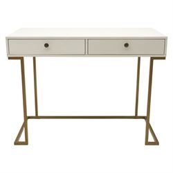 Modern white dressing table, rectangular top above two frieze drawers with bronze metal handles, upon square metal supports