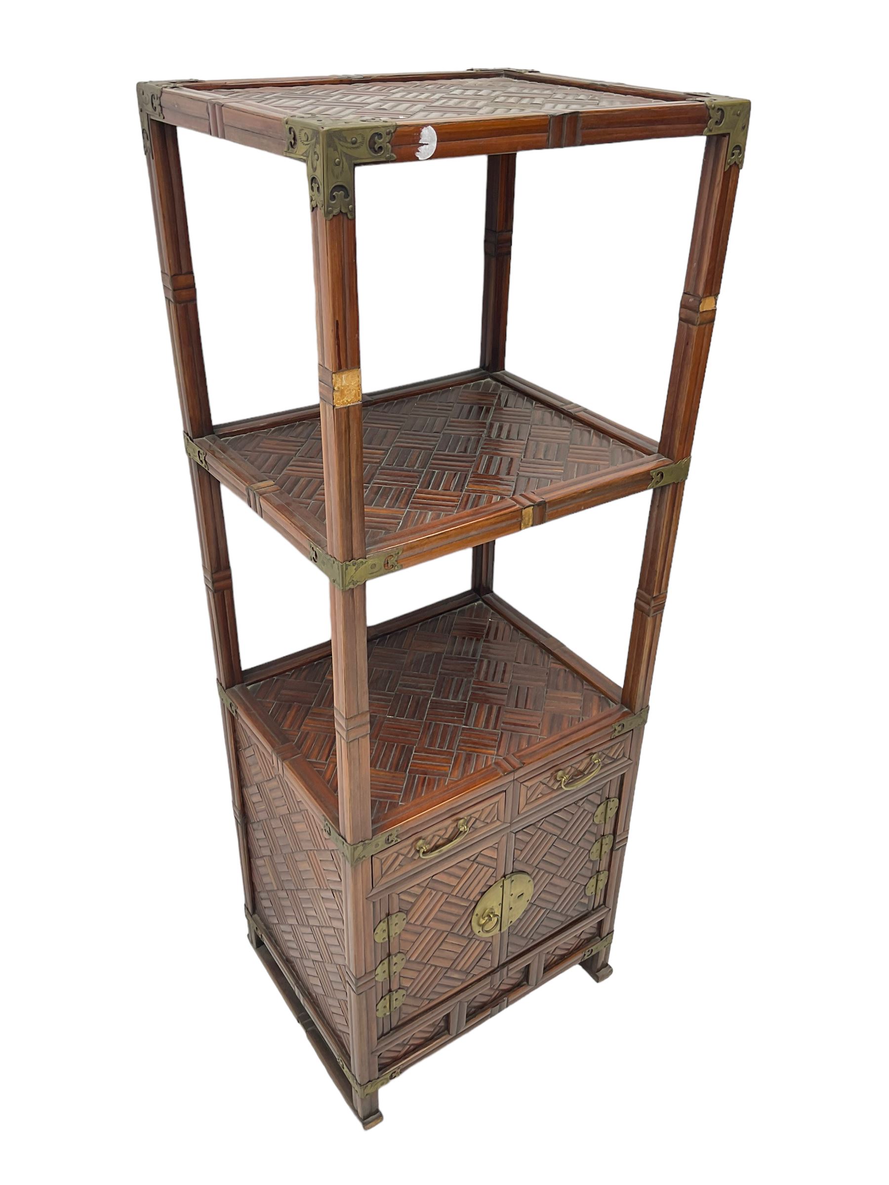 Chinese design bamboo and wood what-not or etagere, parquetry lattice-work bamboo, three tiers over two small drawers and cupboard