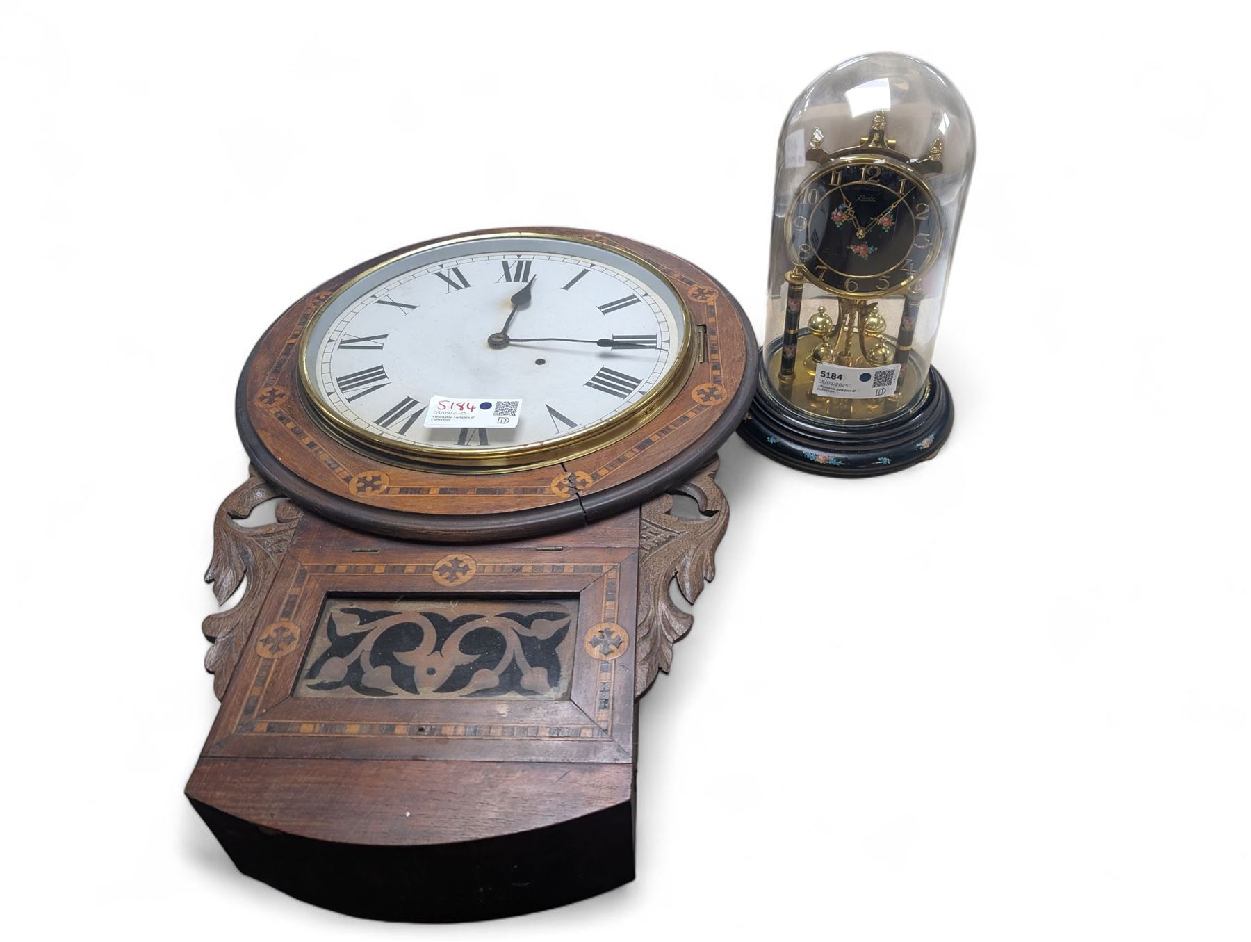 American-Victorian walnut drop dial wall clock with parquetry inlay, c1880, 8-day timepiece movement and a Kundo 1960’s torsion clock with a skeleton movement and four ball oscillating pendulum, with a glass dome. Torsion spring intact.