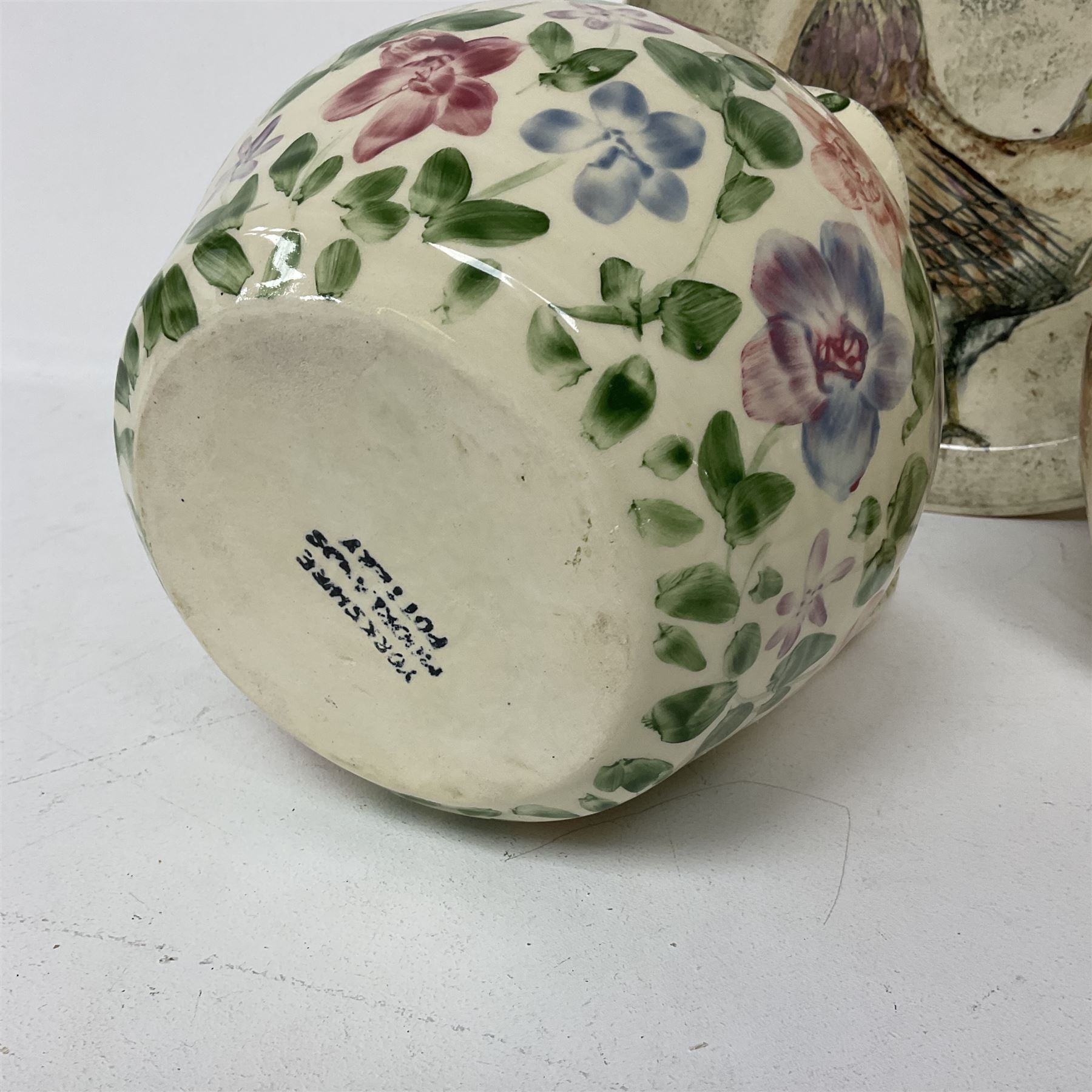 Collection of Yorkshire Moorlands Pottery, comprising two large circular dishes and three jugs, decorated with various fish, flowers, red grouse and cockerel