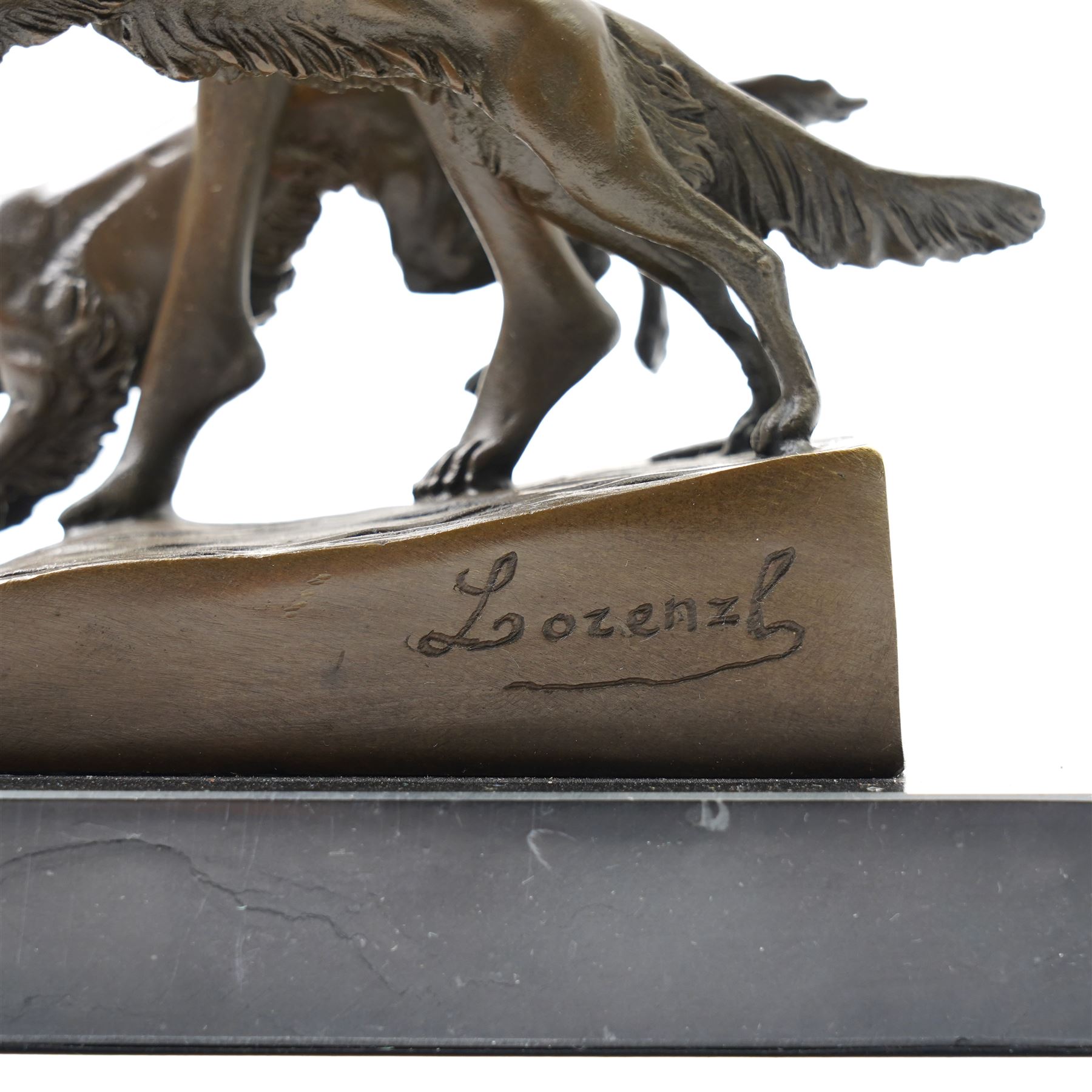 Bronze figure of Diana and her hounds, signed 'Lozenzl' to base, H33cm 