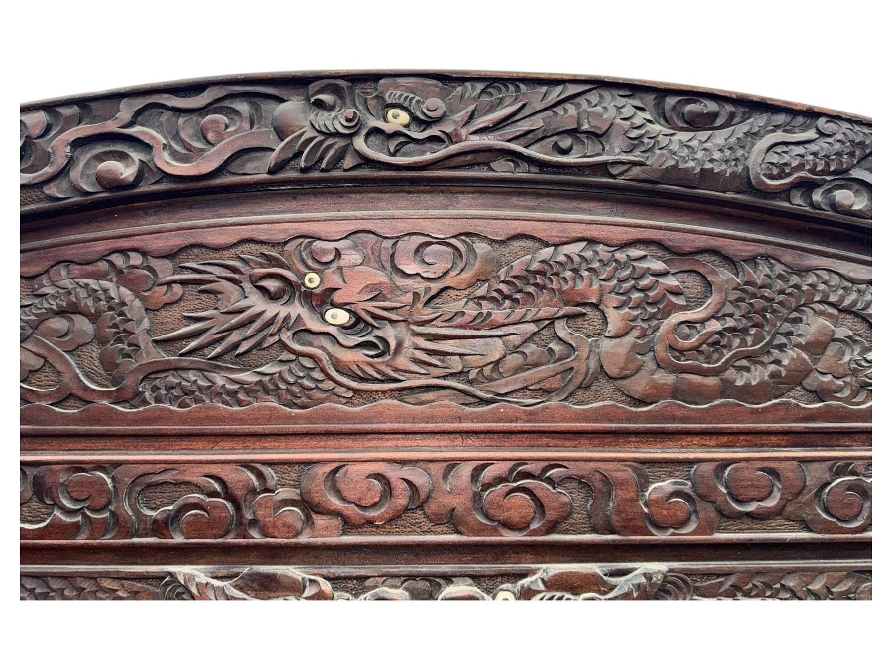 Meiji period (1868–1912), Shibayama lacquer carved hardwood two-fold screen inlaid with mother-of-pearl, bone, and ivory, decorated on one side in high relief and inlaid in a  Shibayama manner with oriental storks flying below flowering branches,  the reverse lacquer panels depicting flowering cherry trees. This item has been registered for sale under section 10 of the APHA Ivory Act.