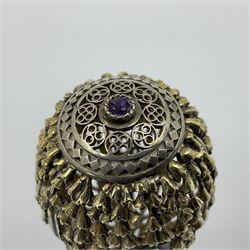 Modern silver limited edition Easter egg, no. 70/500, the gilt openwork body decorated with cascading bluebells and hinged cover with pierced circular panel set with a single faceted purple stone, opening to reveal a gilt interior, upon silver stand with three scrolling pad feet, each hallmarked St James House Company, London 1981, height including stand 8cm