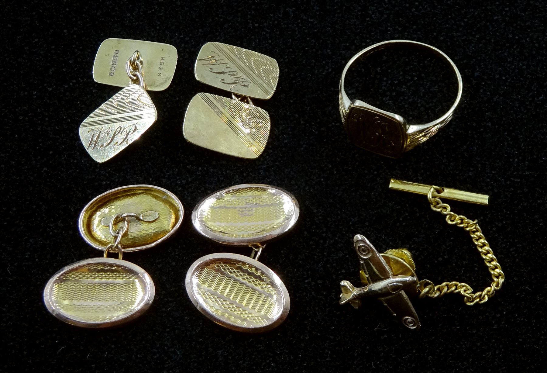 Gold Spitfire tie pin, two pairs of gold cufflinks and a gold signet ring, all 9ct hallmarked or tested