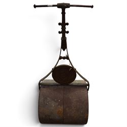 Edwardian cast iron garden lawn roller, handle over crocket-style spoke with moulded roundel medallion