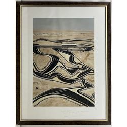 Andreas Gursky (German 1955-): 'Bahrain I' (2005), photographic print, signed and inscribed 'For Mr Speechly, Thanks for your great cooperation, 3/2005' in pencil, image 85.4cm x 59.9cm with full margins, 108.9cm x 81cm overall 

Provenance: gifted to the vendor by the artist in thanks for his help organising the helicopter flight on which the photograph was taken.

Notes: ‘Bahrain I’ was part of the ‘F1 Boxenstopp’ (F1 Pit Stop) series of large format photographs created by the artist, inspired by Formula One motorsport.

The image was created by taking a large number of high-resolution photographs from a helicopter flying at a range of heights over the Bahrain International Circuit, which hosted its first F1 race on the 4th April 2004. Digital manipulation was used to create this breathtaking image which shows many different aspects of the track and the otherwise barren landscape where the track is located in the Sakhir region of the Kingdom. The contrast between the track and the almost colourless desert area is striking.

Viewers of this image can not only gain a feeling of the layout of the track and its sweeping curves but can also, on closer inspection, observe details of the track layout and infrastructure; furthermore, there are actually a number of F1 cars on the track.

The vendor was given the work as a thank you from the artist for his assistance during the creation of the photograph; the vendor was on-board the helicopter with the artist at the point the image was taken.