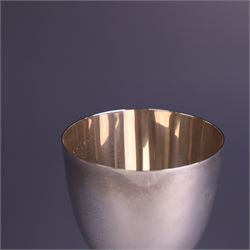 Late 20th century limited edition silver goblet, produced by Garrard & Co Ltd  to commemorate the silver wedding anniversary of Her Majesty Queen Elizabeth II and His Royal Highness the Duke of Edinburgh, the bowl engraved with Royal cyphers and anniversary dates, upon a knopped stem and embossed foot, no. 77/2000, hallmarked Garrard & Co Ltd, London 1972, H15cm