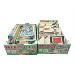 Twelve scale model kits, comprising ten 