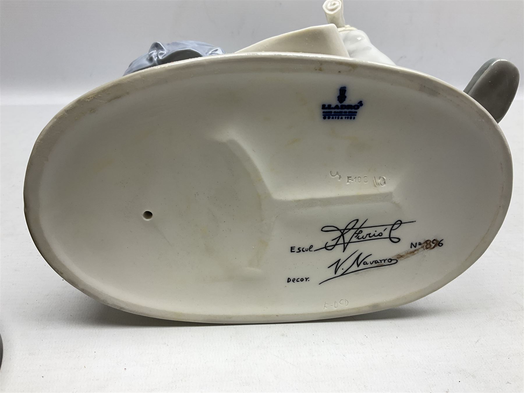 Lladro figure, Columbus, modelled as Christopher Columbus stood by a globe, limited edition 896/1200, no 1432, sculpted by Salvador Furio, with original box, year issued 1982, year retired 1988, H42cm