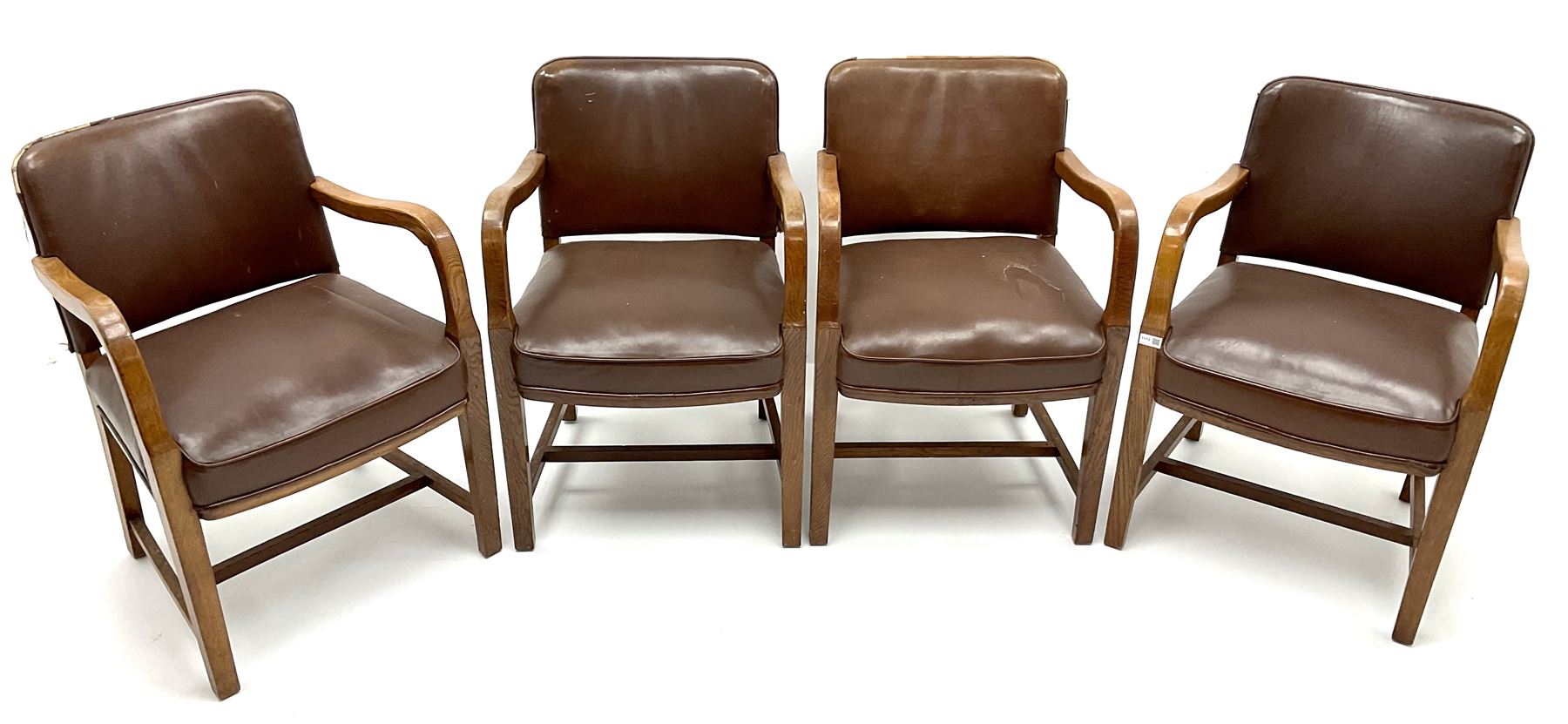 Set four mid century oak framed boardroom chairs, upholstered back and