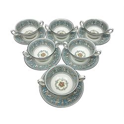 Six Wedgwood Florentine pattern twin handled soup bowls and saucers 