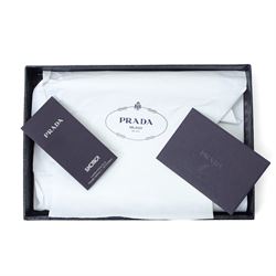 Prada - Saffiano Metal zip-around wallet, black Saffiano leather with gold-tone hardware and applied logo plaque, zip-around fastening with wrist strap and fitted interior, with authenticity card and original box