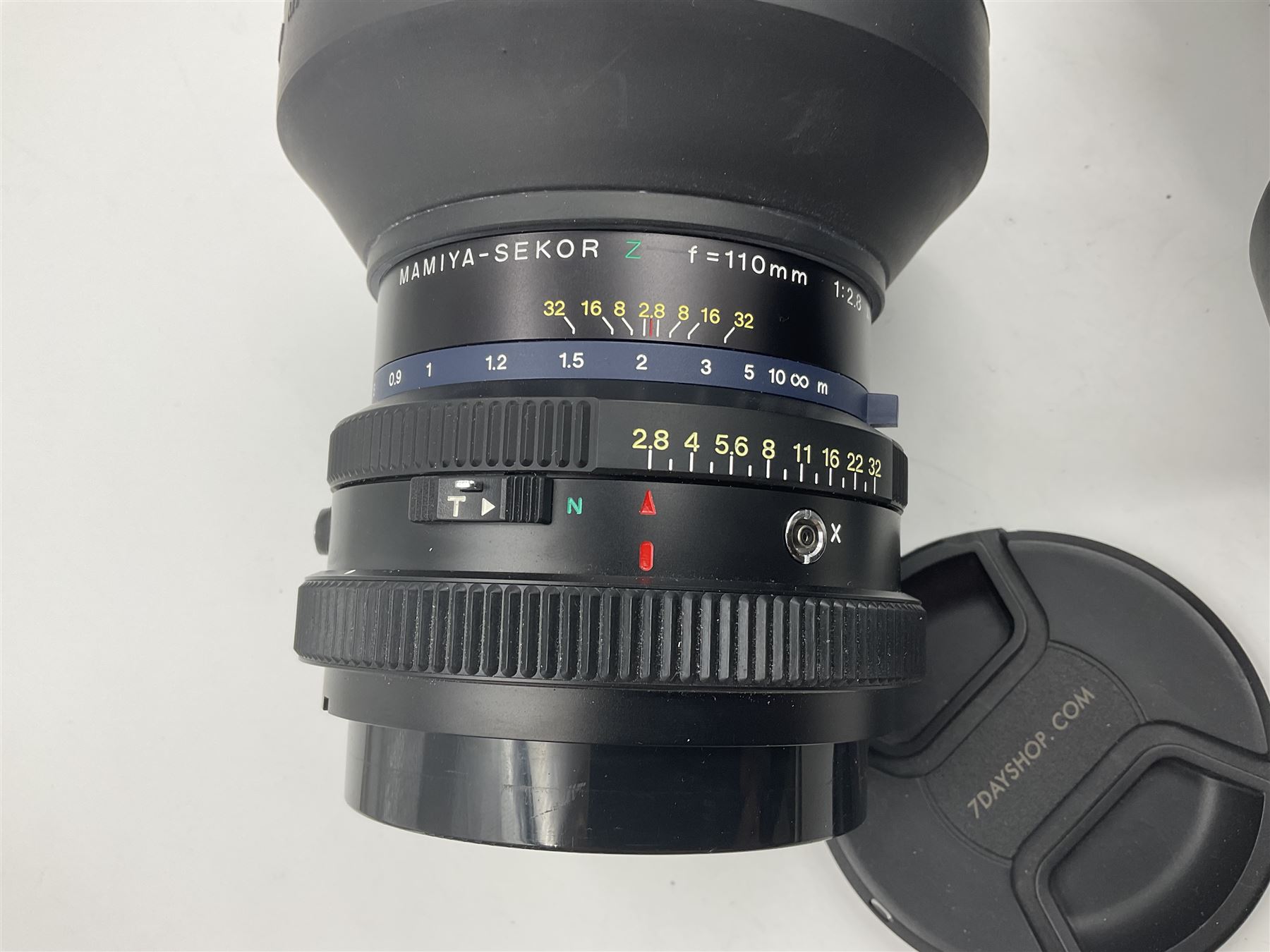 Seiko 'Mamiya Macro M 1:4.5 f=140mm M/L-A' lens serial no 003593 and Seiko 'Mamiya-Sekor Z f=110mm 1:2.8W' lens, serial no 56560