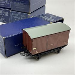 Hornby Dublo - eight D1 wagons comprising Petrol Tank Wagon 'Esso' buff coloured; Petrol Tank Wagon 'Esso' silver coloured; Oil Tank Wagon 'Royal daylight'; Fish Van; Meat Van; Cattle Truck; Horse Box; and Goods Van; all in dark blue boxes (8)