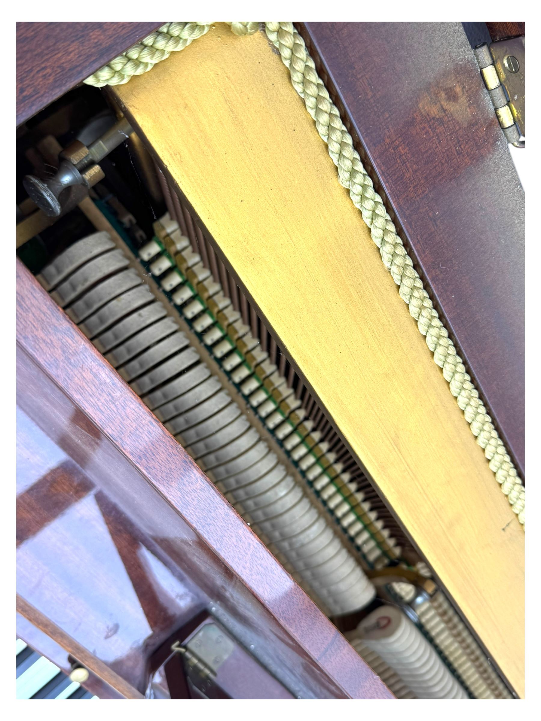Knight - upright piano in mahogany gloss lacquered case, with stool,  rectangular slide back fall front enclosing full keyboard, with twin brass pedals, cabriole legs 