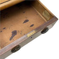 Howard & Sons. - 19th century walnut twin pedestal desk, moulded rectangular top with tooled leather inset, fitted with nine drawers with circular pressed brass handle plates decorated with urns, each drawer fitted with a 'Hobbs, London' lock, on plinth base, the upper right-hand drawer stamped 'Howard & Sons, Berners St.' and with paper label