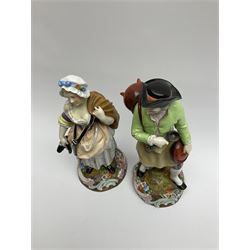 Pair of 19th Century continental figures, possibly German, the first example modelled as a man carrying cooking equipment seated upon a tree stump, the second modelled as a woman in a bonnet carrying shoes. H28cm.  