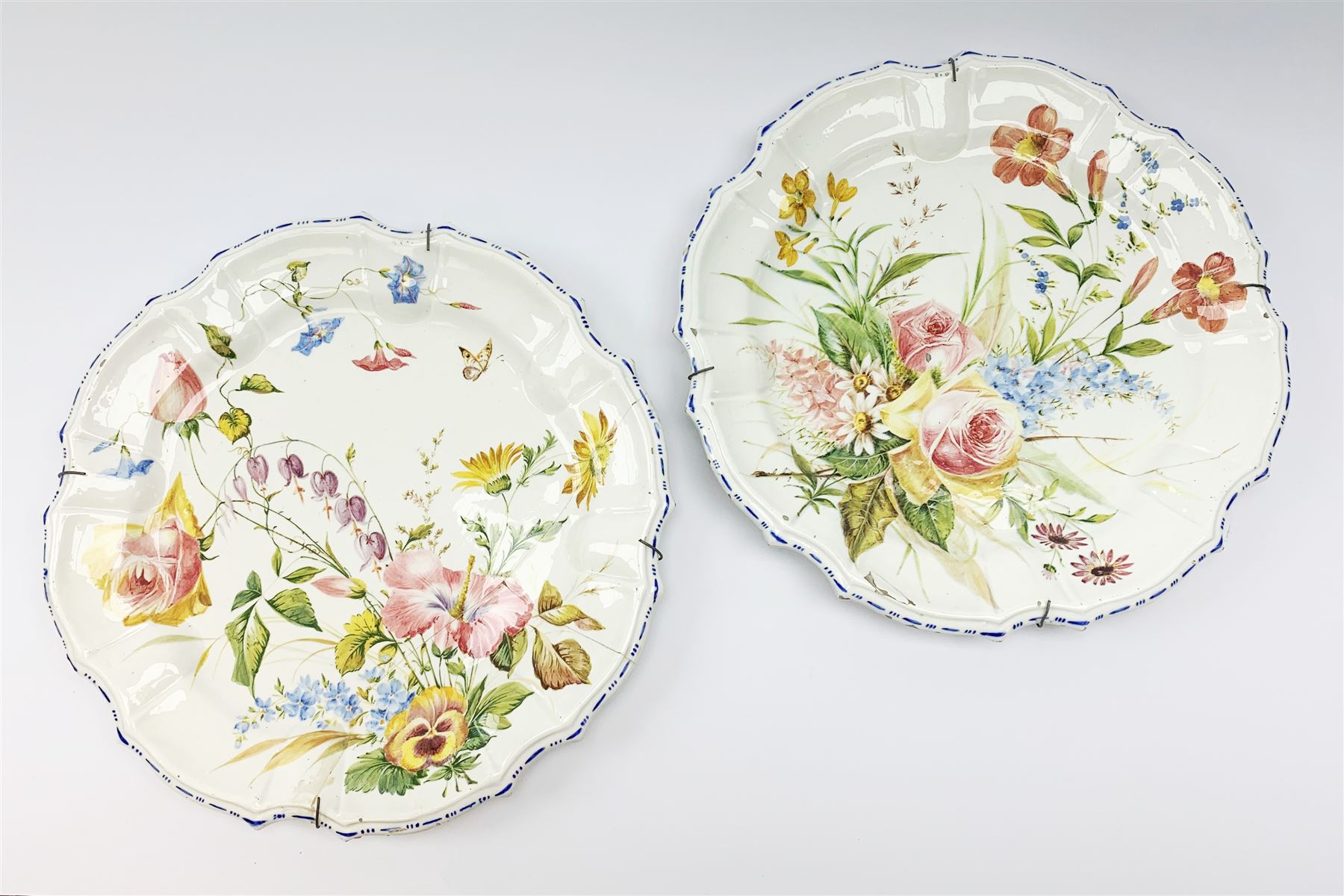 A pair of Italian faience pottery plates | Antiques