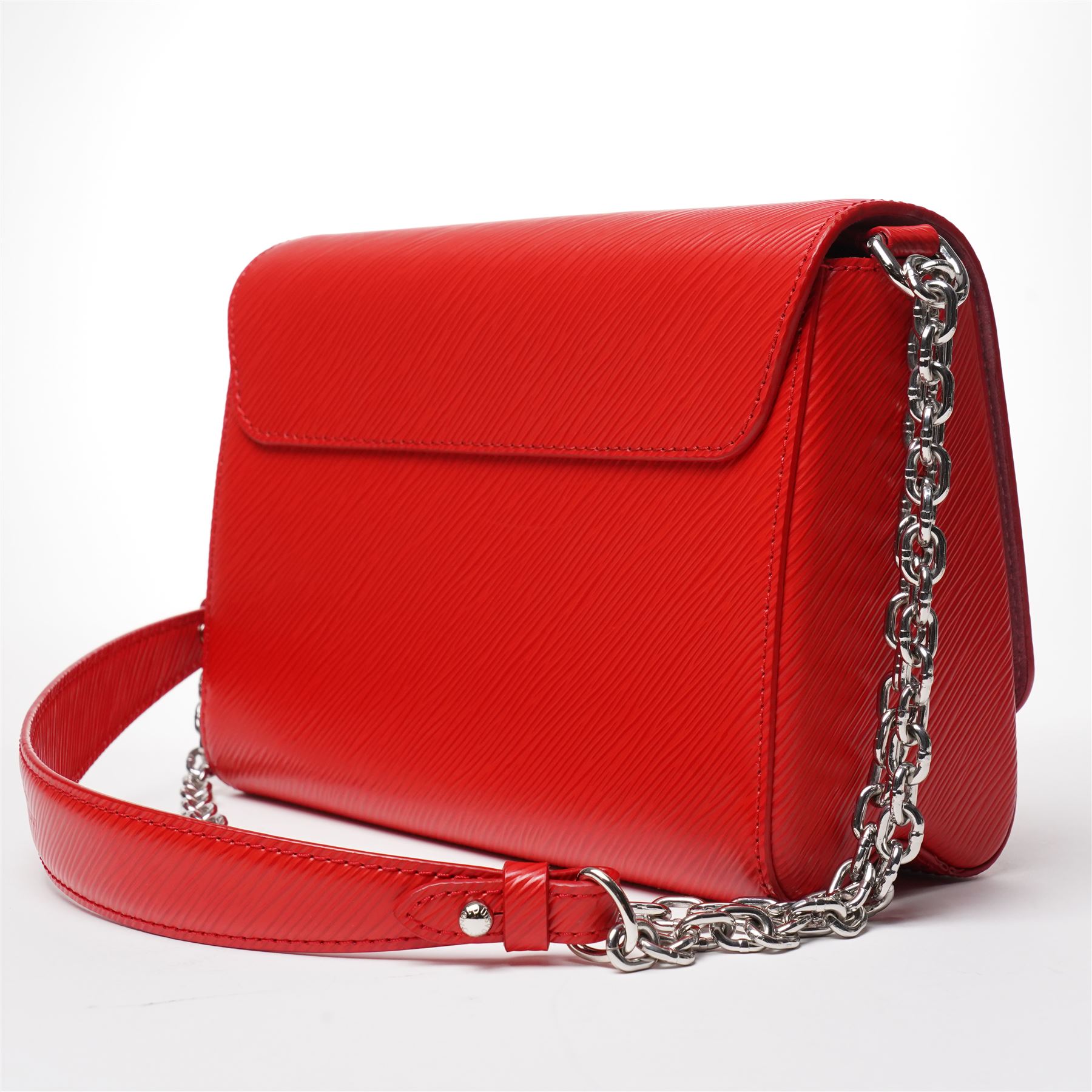 Louis Vuitton - ‘Twist’ MM Bag, the model introduced for the Cruise 2015 collection under Nicolas Ghesquière, in structured Coquelicot red Epi leather, with silver-tone LV twist-lock fastening and chain and carrying handle, with detachable flat leather shoulder or crossbody strap, unused with original box and dust bag
