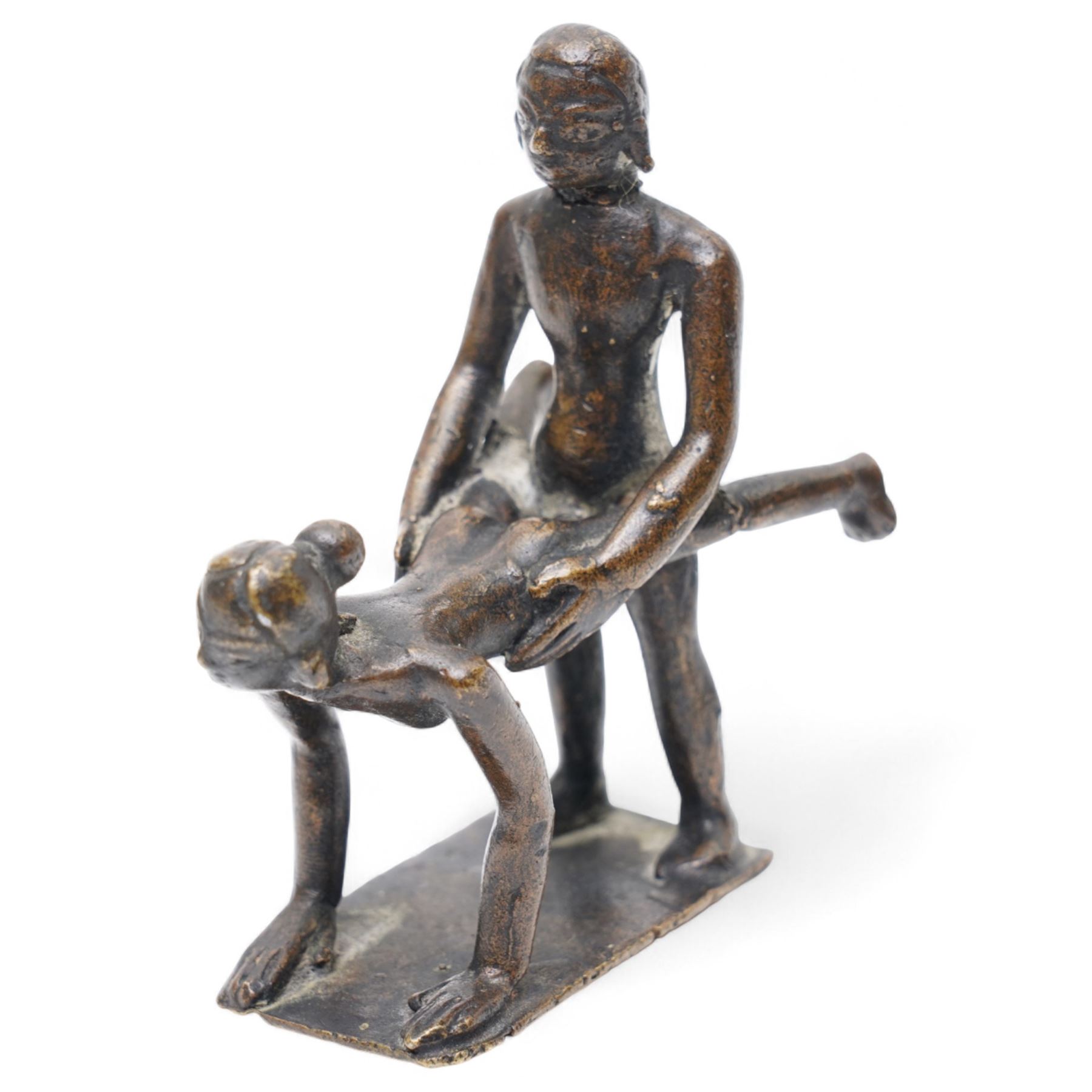 Three Indian school Kama Sutra style erotic bronze figures, H9cm