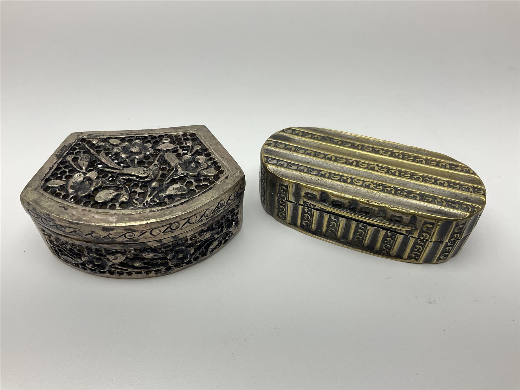 Five snuff boxes, including novelty snuff box in the form of a shoe, pierced example, rectangular hinged lid with white metal decoration and two others  