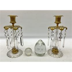 Pair of candlesticks with brass mounts and faceted drops, H25.5cm, together with two glass paperweights