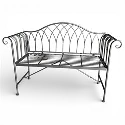 Black powder coated metal bench in a Victorian style