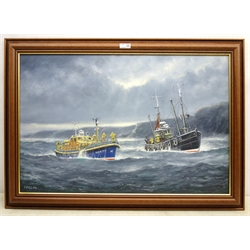  Jack Rigg (British 1927-): Whitby Lifeboat and a Trawler off the Coast, oil on board signed and dated 2004,  50cm x 75cm  DDS - Artist's resale rights may apply to this lot    