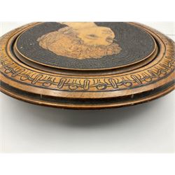 Aesthetic movement satin walnut turned pokerwork panel, of circular form depicting a head and shoulder portrait of a young figure, within a stylised border, D31cm