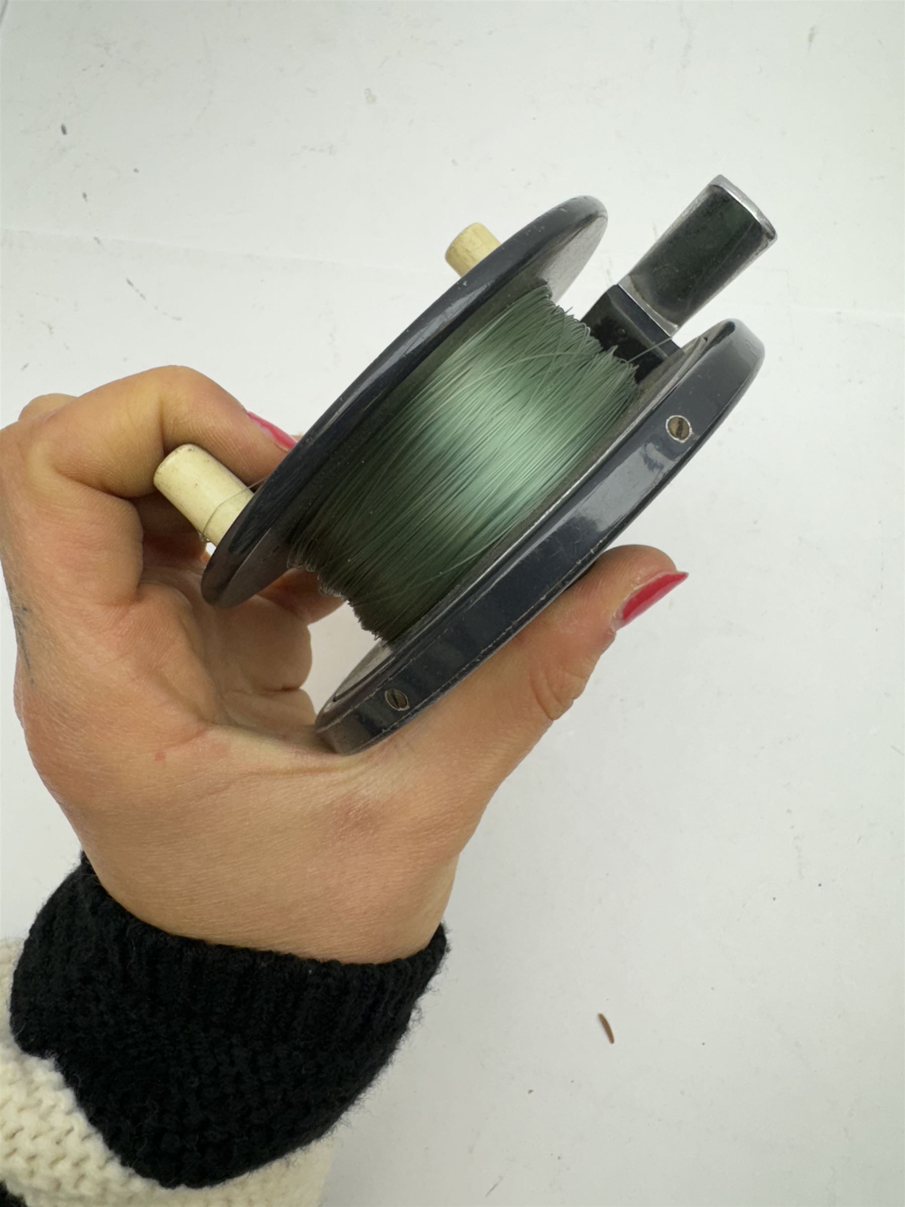 D. Slater, Newark, wood, alloy and brass star-back centre pin reel,  together with three other wooden/alloy reels including Edge Elite, Milbro Pelican and one other 