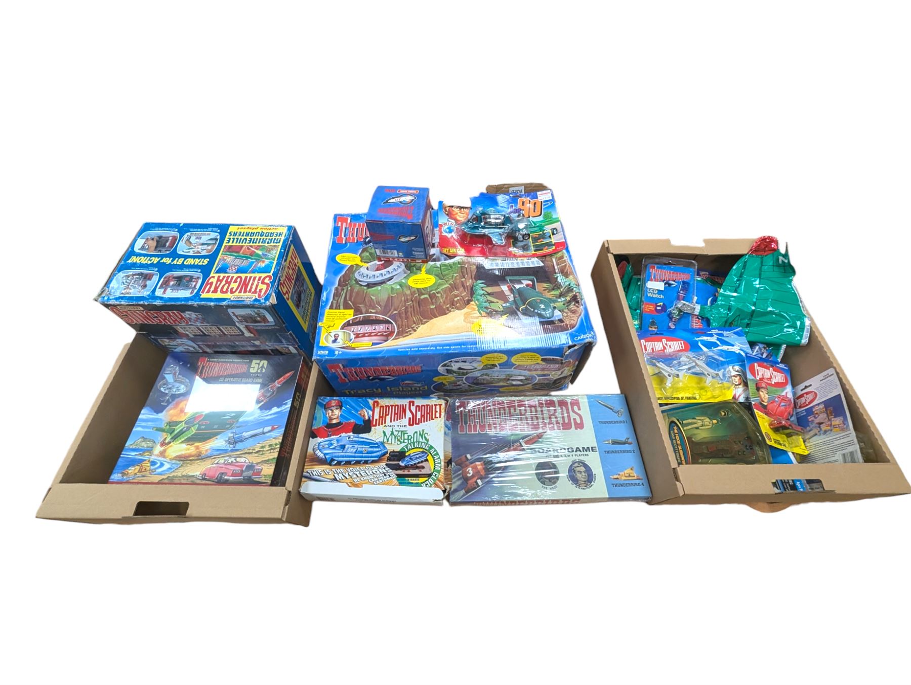 Gerry Anderson interest collectables and toys, including Carlton Thunderbirds Tracy Island, Matchbox Stingray Marineville Headquarters, both boxed, Matchbox carded Thunderbirds and Stingray figures and vehicles, Captain Scarlet and Joe90 collectables, etc