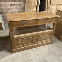 Late Victorian oak buffet stand, moulded rectangular top over under-tier and double cupboard, enclosed by panelled doors, on skirted base - THIS LOT IS TO BE COLLECTED BY APPOINTMENT FROM THE OLD BUFFER DEPOT, MELBOURNE PLACE, SOWERBY, THIRSK, YO7 1QY