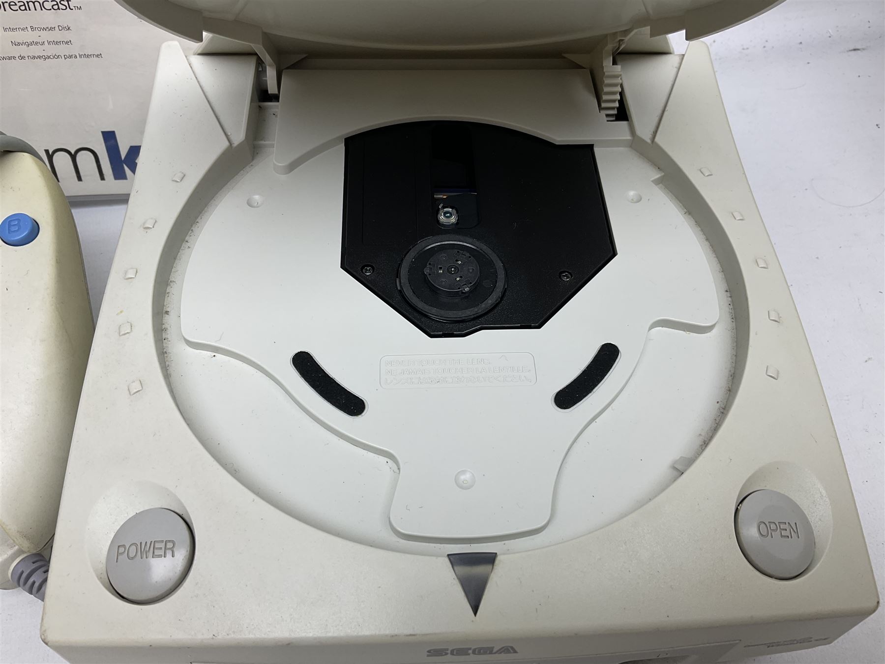 Dreamcast console, one controller, original instruction booklet with magazine and four games, ‘Aerowings’, ‘Buggy Heat’, ‘ Racing Simulation Monaco Grand Prix’ and ‘Who Wants to be a Millionaire’, all in original cases with instruction booklets 