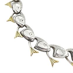 Brett Payne silver and 9ct gold fish necklace, twenty-five links each with silver fish heads and 9ct gold tails, Sheffield 1999, boxed