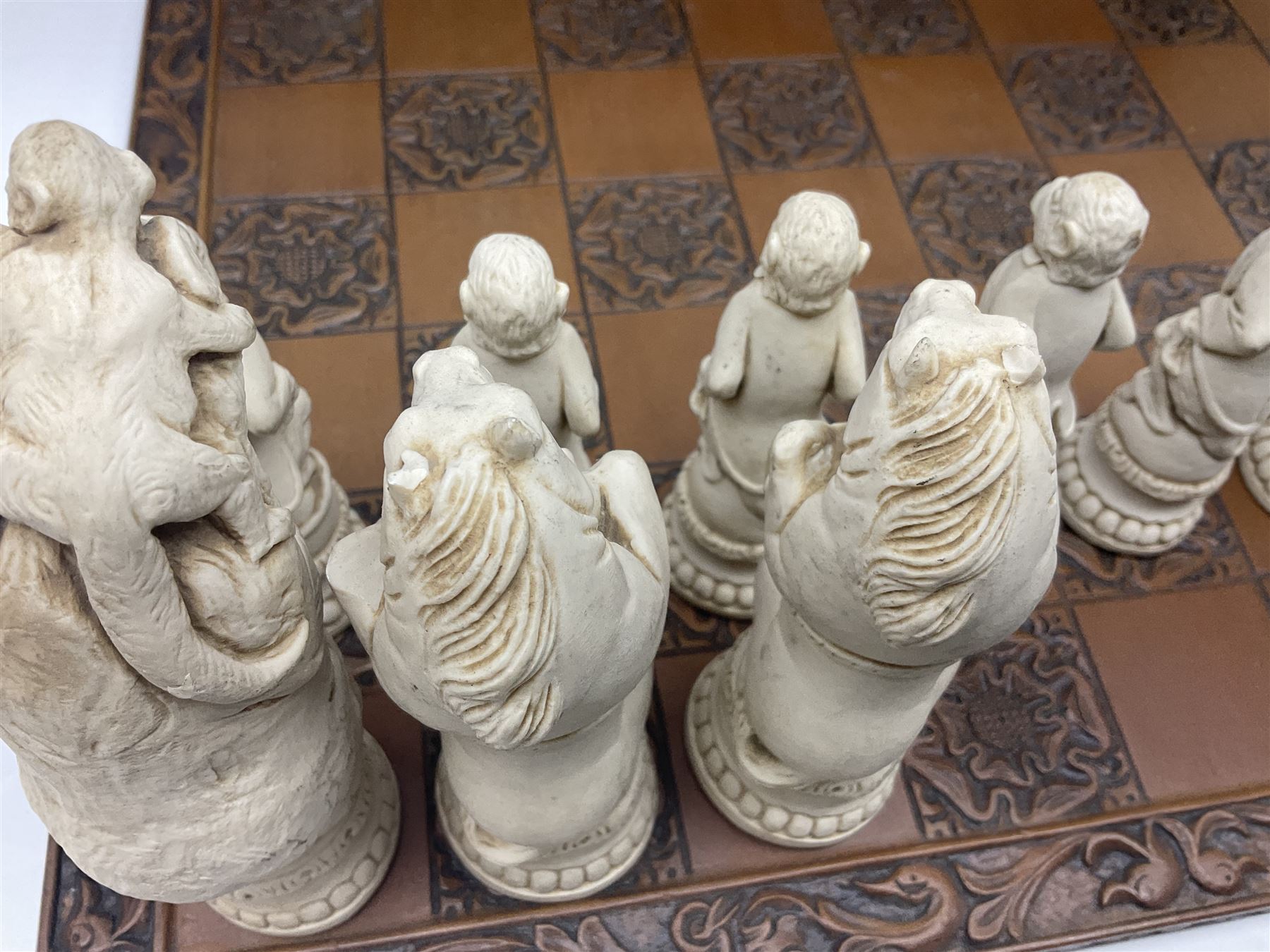 Chess set and resin chess pieces moulded as various animals, the pawns as monkeys, Kings as lions etc, board L46cm, W46cm, king H19cm