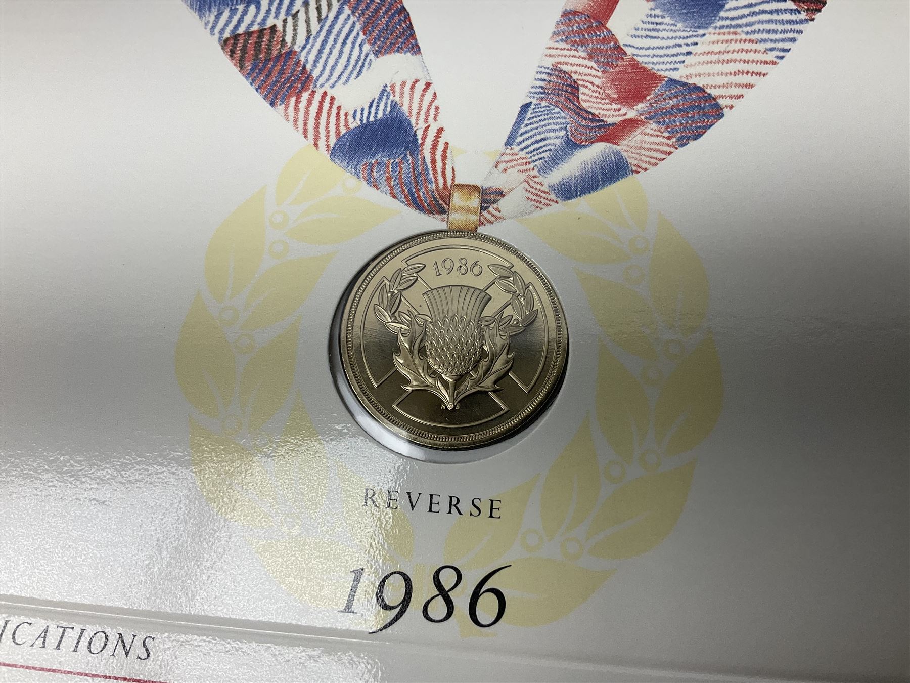 Two Great Britain and Northern Island proof sets dated 1970 and 1971, both with card cases, three 1986 Commonwealth Games commemorative two pound coins, in card folders, and six brilliant uncirculated one pound coins, in card folders