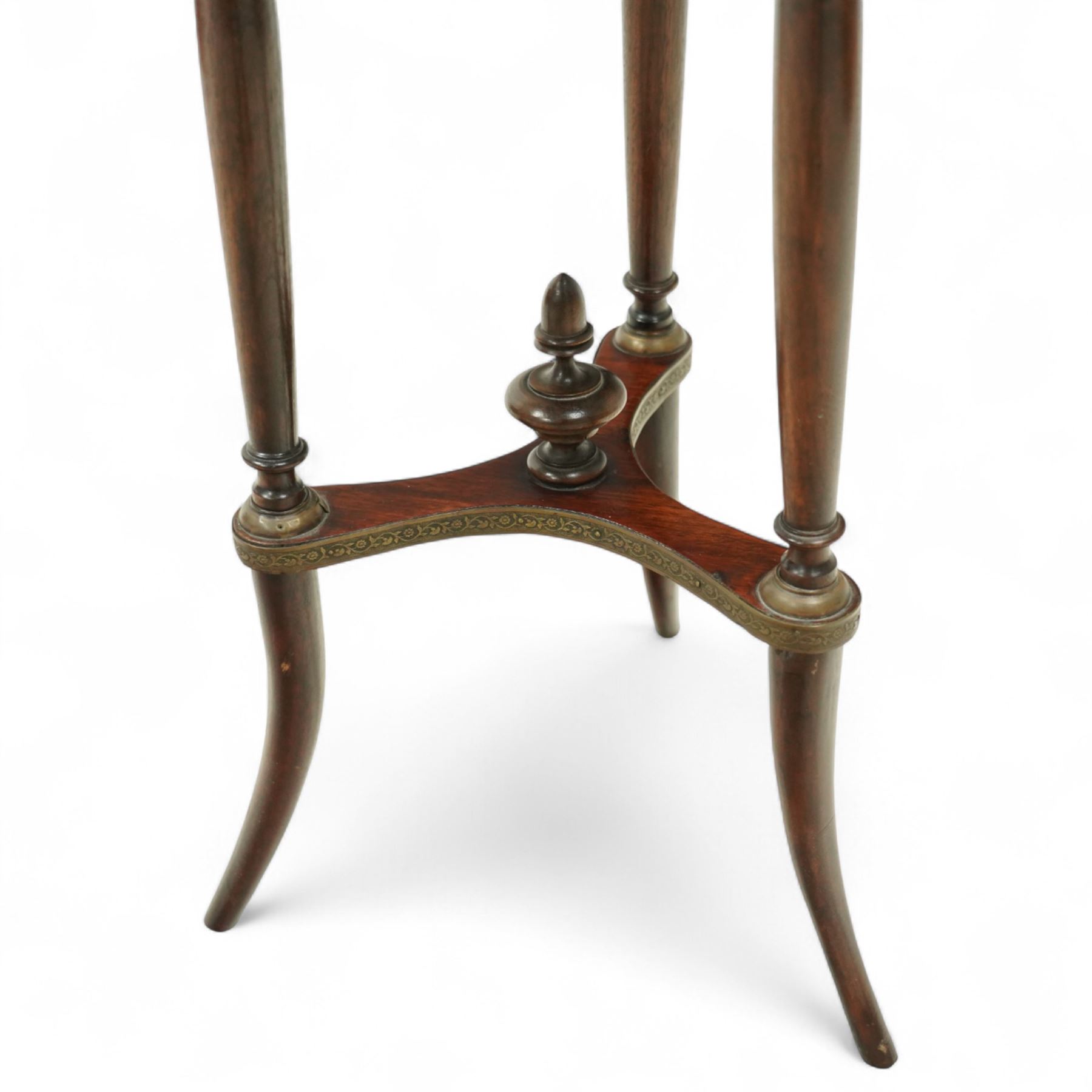 Late 19th century French Empire style mahogany and gilt metal mounted jardinière stand, circular rouge marble top with pierced brass gallery, on three turned supports joined by an undertier stretcher and splayed legs