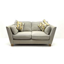 Two seater settee, upholstered in grey fabric, shaped oak supports