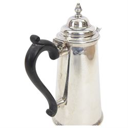 1930's silver two piece cafe au lait set, comprising coffee pot and a hot milk jug, each of tapered cylindrical form, with ebonised handles, hallmarked Nayler Brothers, London 1933, H19cm