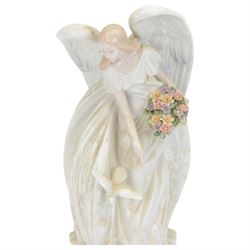 Lladro figure Flowers of Peace, modelled as an angel holding flowers, no 1867, H33cm