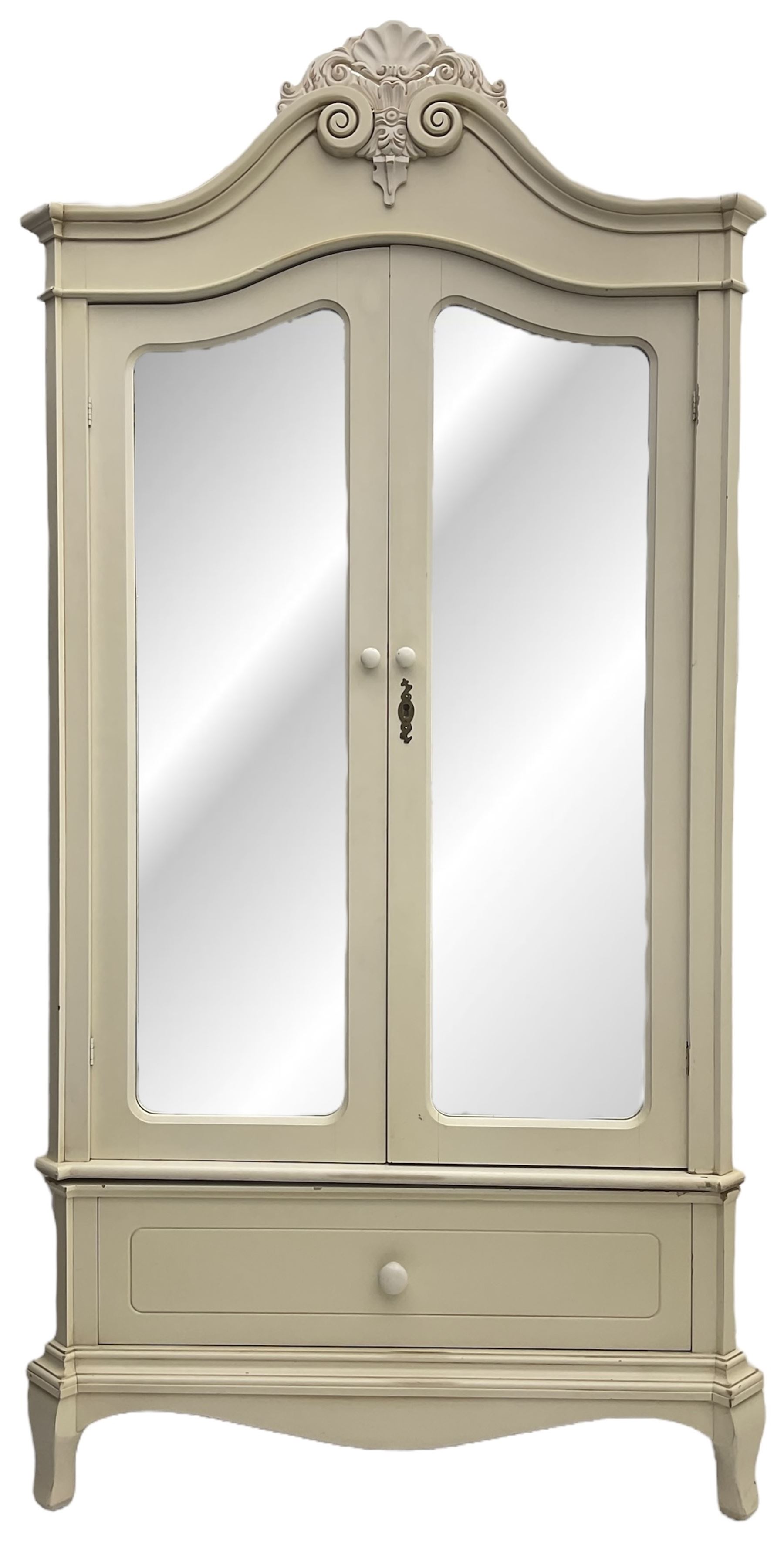 French design cream painted armoire wardrobe, shaped top with shell and flower head pediment, enclosed by two mirror glazed doors, the base fitted with single drawer