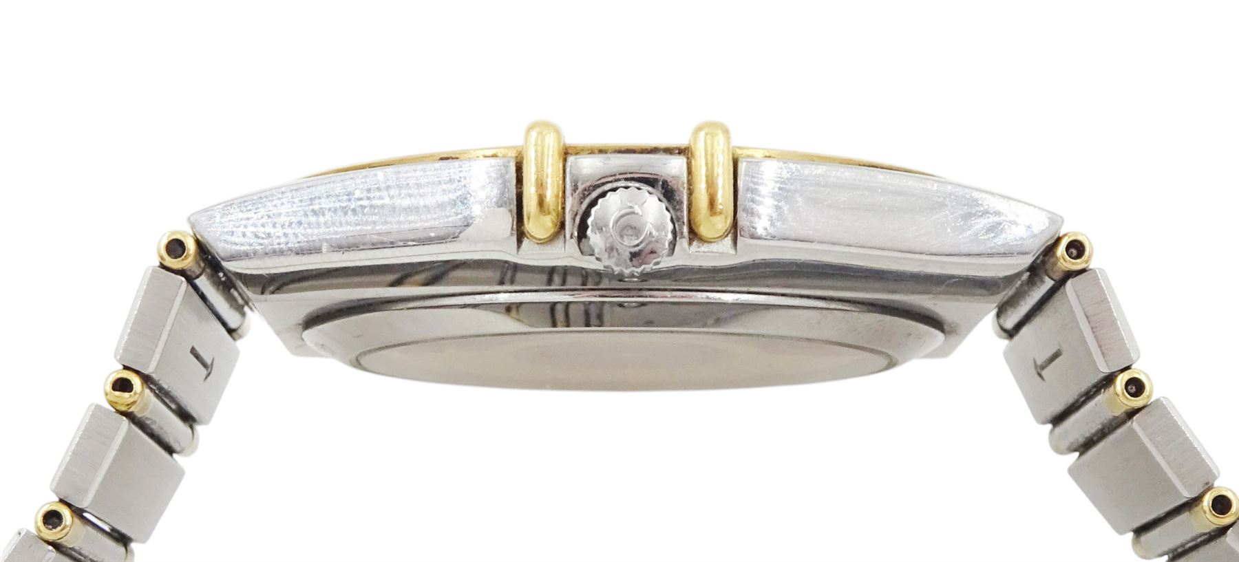 Omega Constellation gentleman's stainless steel and gold automatic chronometer wristwatch, Ref. Cal. 1111, serial No. 49547890, white dial with date aperture and exhibition back case, on integral bracelet No. 1448.5/431, with fold-over clasp