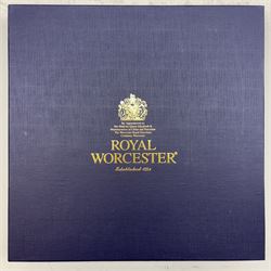 Late 20th century Royal Worcester star plate, of circular form with shaped with gilt shaped rim, hand painted by E Clark with still life of fruit upon mossy ground, signed E Clarke, with marks beneath including limited edition no 28/100, with makers fitted card box, D23cm
