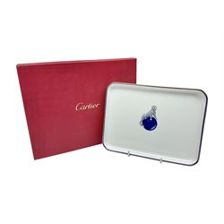 Limoges for Cartier, ceramic trinket dish, of rectangular form with rounded corners, decorated to centre with leopard upon a blue ball, with blue and gilt rim, with printed mark beneath, in original box, H15.5cm, W21cm
