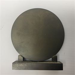 Bronzed circular plaque, depicting Le Chapelet (The Rosary), on integral stand, H8cm
