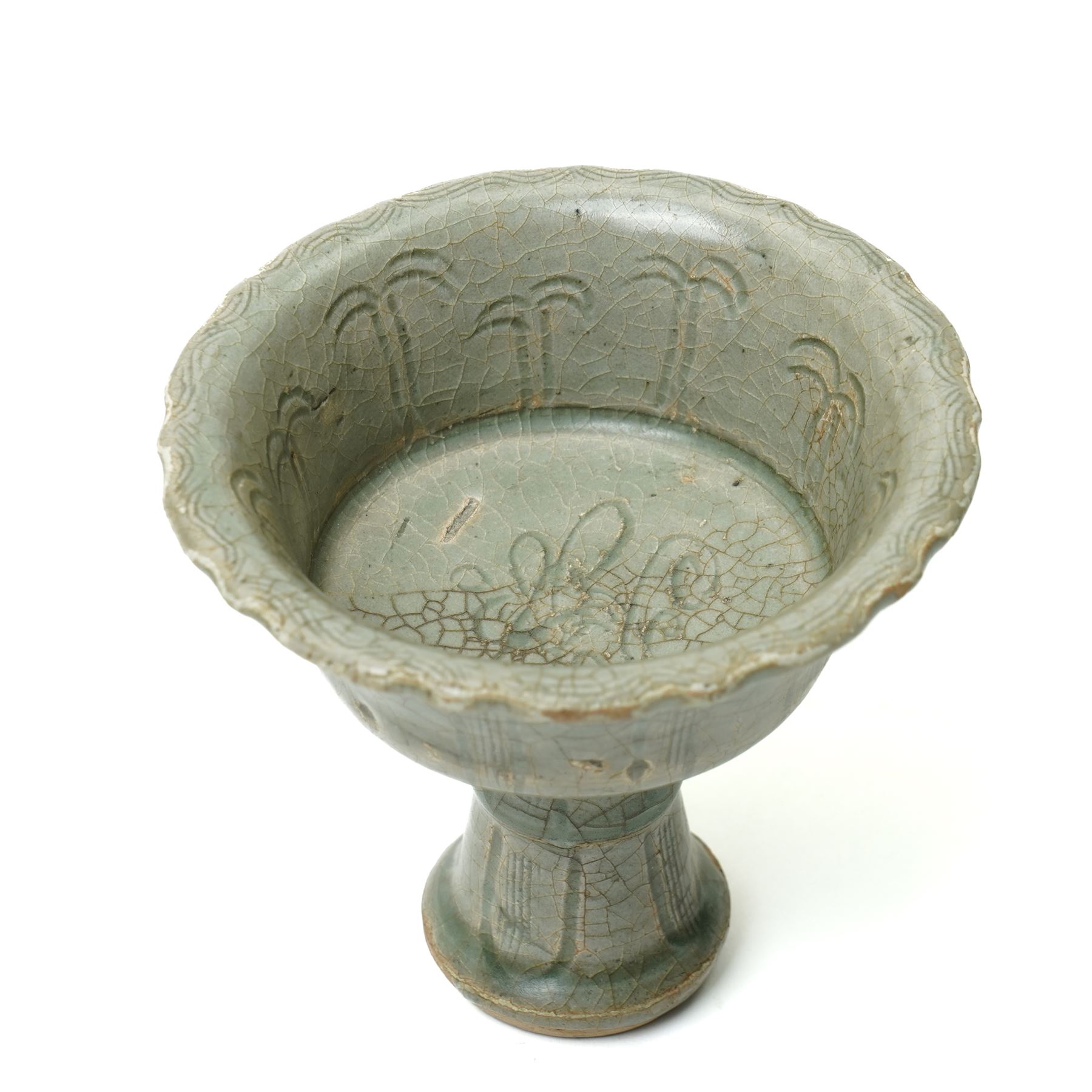 Chinese Ming dynasty Longquan celadon stem cup, of flared form rising from a splayed foot, incised decoration to stem and bowl, with fluted rim, unmarked, H10cm