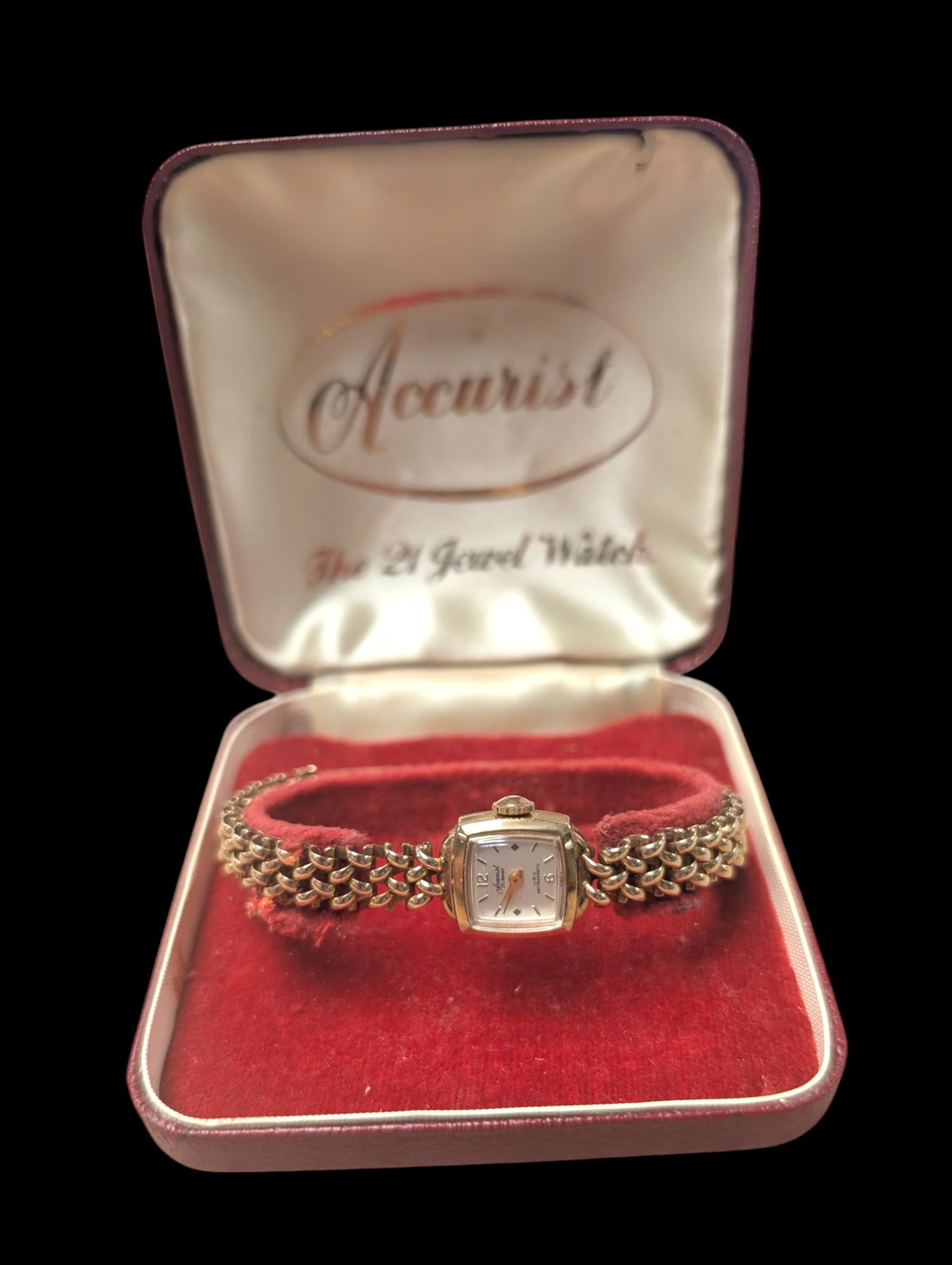Accurist 9ct ladies manual wind wristwatch, on integral 9ct gold bracelet