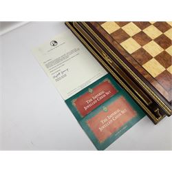Franklin Mint House of Faberge 'The Imperial Jewelled Chess Set', to include set of chess pieces with malachite finish and a set with carnelian finish and a hardwood chess board