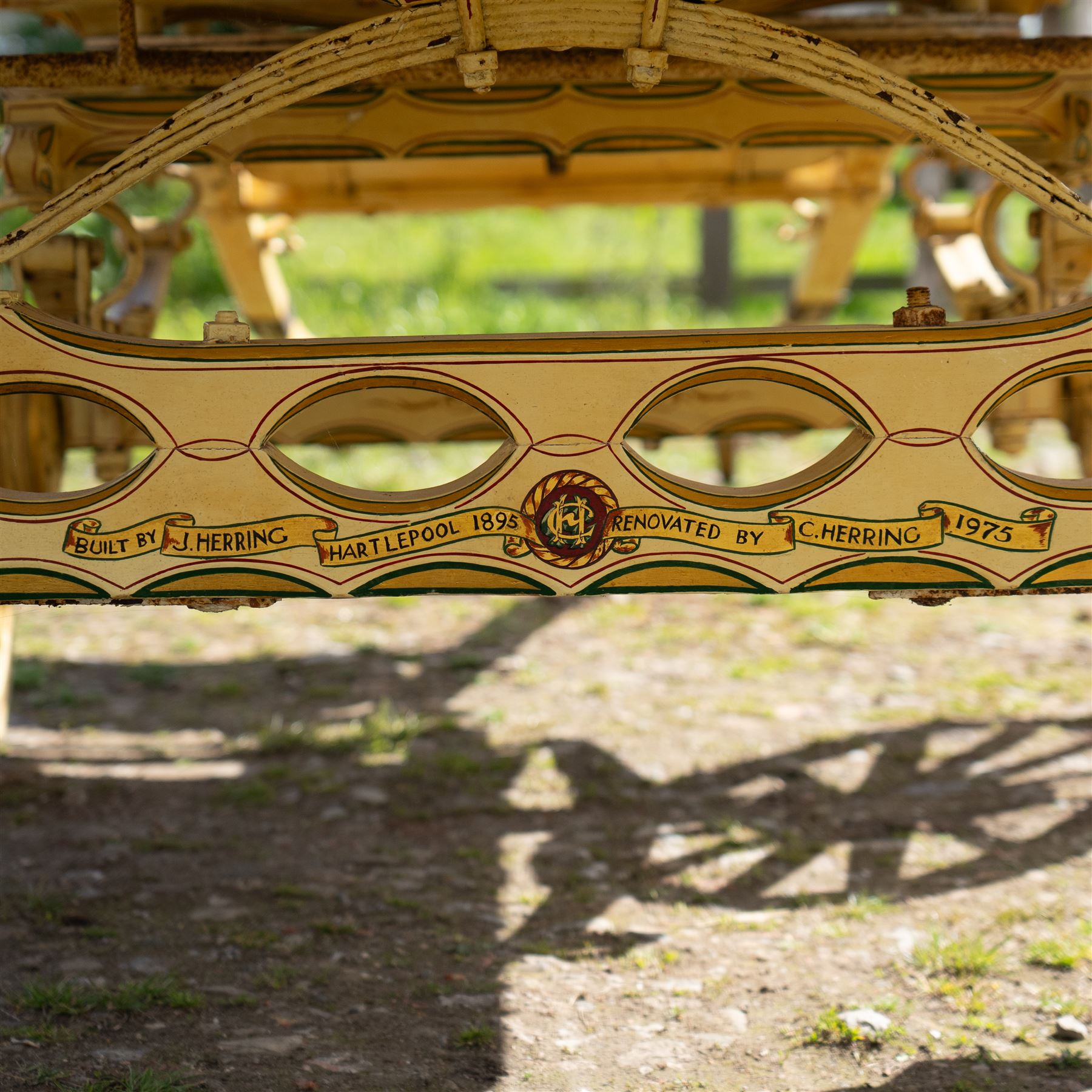 Advertising Trade Dray Wagon for C. Herring & Son, Hartlepool, Dated 1895 and Renovated 1975

An exceptionally decorative late Victorian horse drawn advertising trade dray, built by J. Herring of Hartlepool in 1895 and later renovated by C. Herring in 1975, as recorded by the painted inscription beneath the body. Finished in a striking cream and maroon livery with extensive hand painted signwriting, the wagon carries the name C. Herring & Son, Iron & Steel Processors, Hartlepool along its sides and rear panels. The wagon is fitted with a flat timber loading bed, twin shafts for a single horse, elegant spoked wooden wheels, iron bound tyres, rear headboard and traditional undercarriage with leaf spring suspension. Richly detailed scrollwork and lining throughout make this a particularly attractive example, suitable for collection, display, museum, promotional or coaching purposes.

Features

• Built by J. Herring, Hartlepool, 1895
• Renovated by C. Herring in 1975
• Original style hand painted advertising signwriting
• Flat timber loading platform
• Raised rear headboard with decorative pierced gallery
• Twin shafts for a single horse
• Wooden spoked wheels with iron tyres
• Traditional leaf spring suspension
• Extensive decorative lining and scrollwork throughout
• Attractive cream and maroon colour scheme
• Suitable for private collection, museum or display use

Dimensions:
Overall length: 560 cm
Body length: 300 cm
Width: 158 cm
Height: 150 cm

Wheel Diameters:
Front wheels: 76 cm
Rear wheels: 86 cm